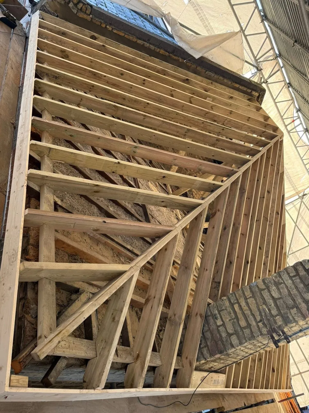 New roof timbers and rafters during a re-roof in Totnes