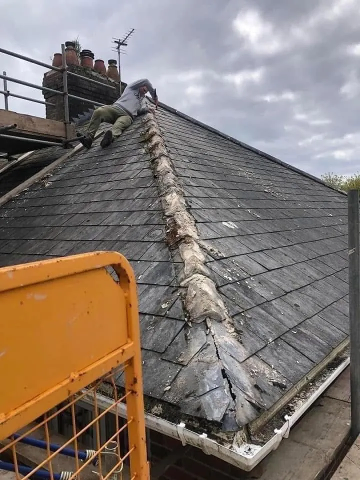 Slate roof ridge and chimney repair in Totnes